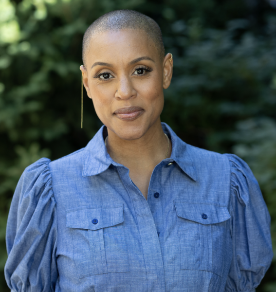 Cropped Ivy headshot in trees lips together July 22